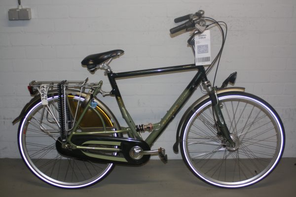 een grijs met zwarte koga herenfiets met zwarte zadel kettingkast